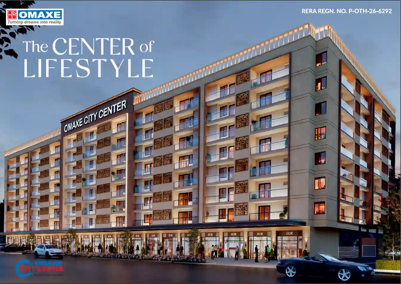 Exterior twilight view of Omaxe City Center modern residential apartments and ground-floor commercial shops in Indore.