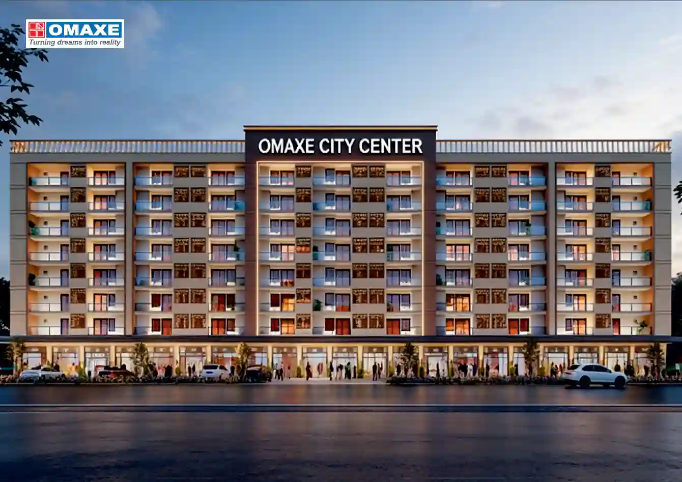 Beautifully landscaped roundabout with golden statues and wide asphalt roads inside Omaxe City township, Indore.